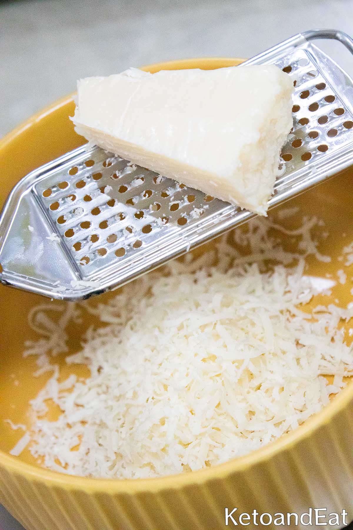 Grating Cheese for Keto Creamy Chicken
